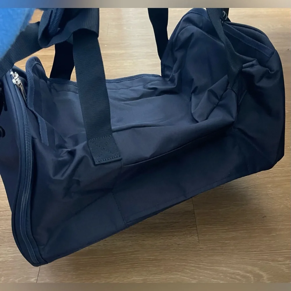 Bella Russo navy blue duffle bag